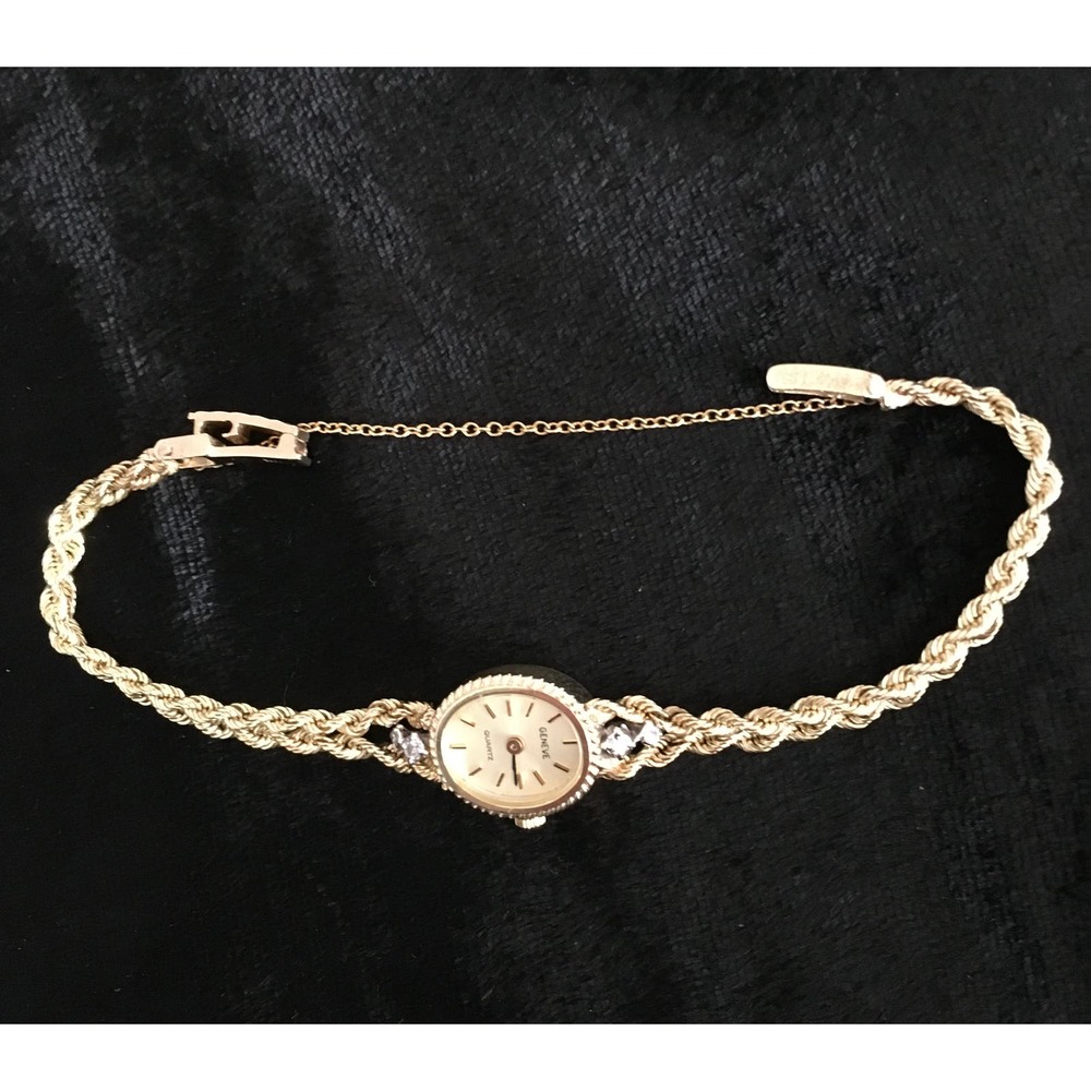 Vintage Geneve 14K Yellow Gold Watch with diamond accents.